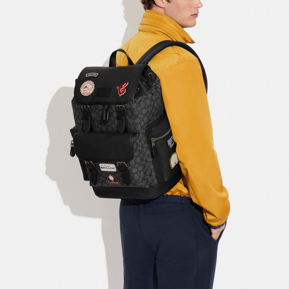 SPRINT BACKPACK IN SIGNATURE JACQUARD WITH SKI PATCHES