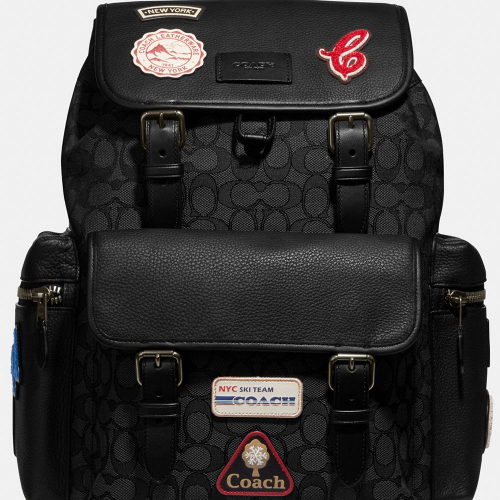 SPRINT BACKPACK IN SIGNATURE JACQUARD WITH SKI PATCHES