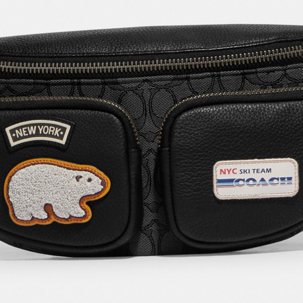 SPRINT BELT BAG IN SIGNATURE JACQUARD WITH SKI PATCHES