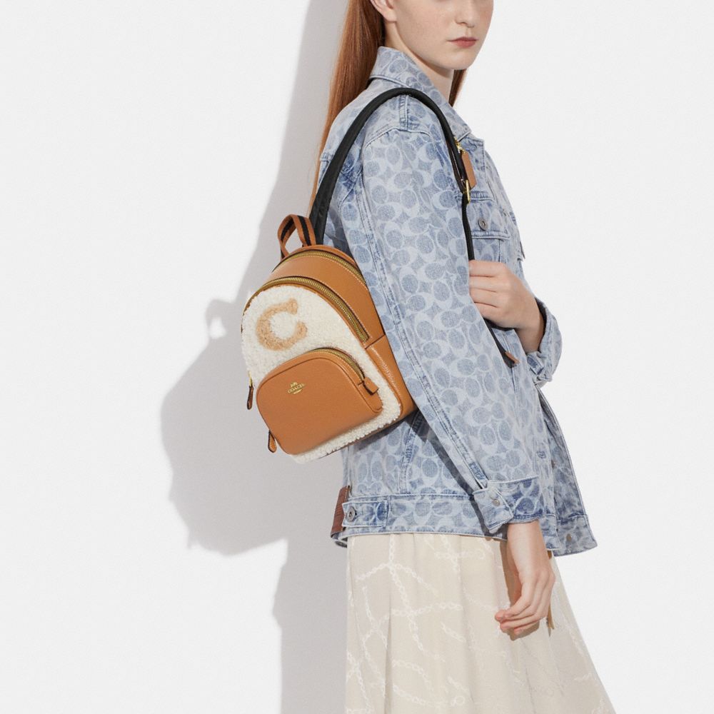MINI COURT BACKPACK WITH COACH MOTIF