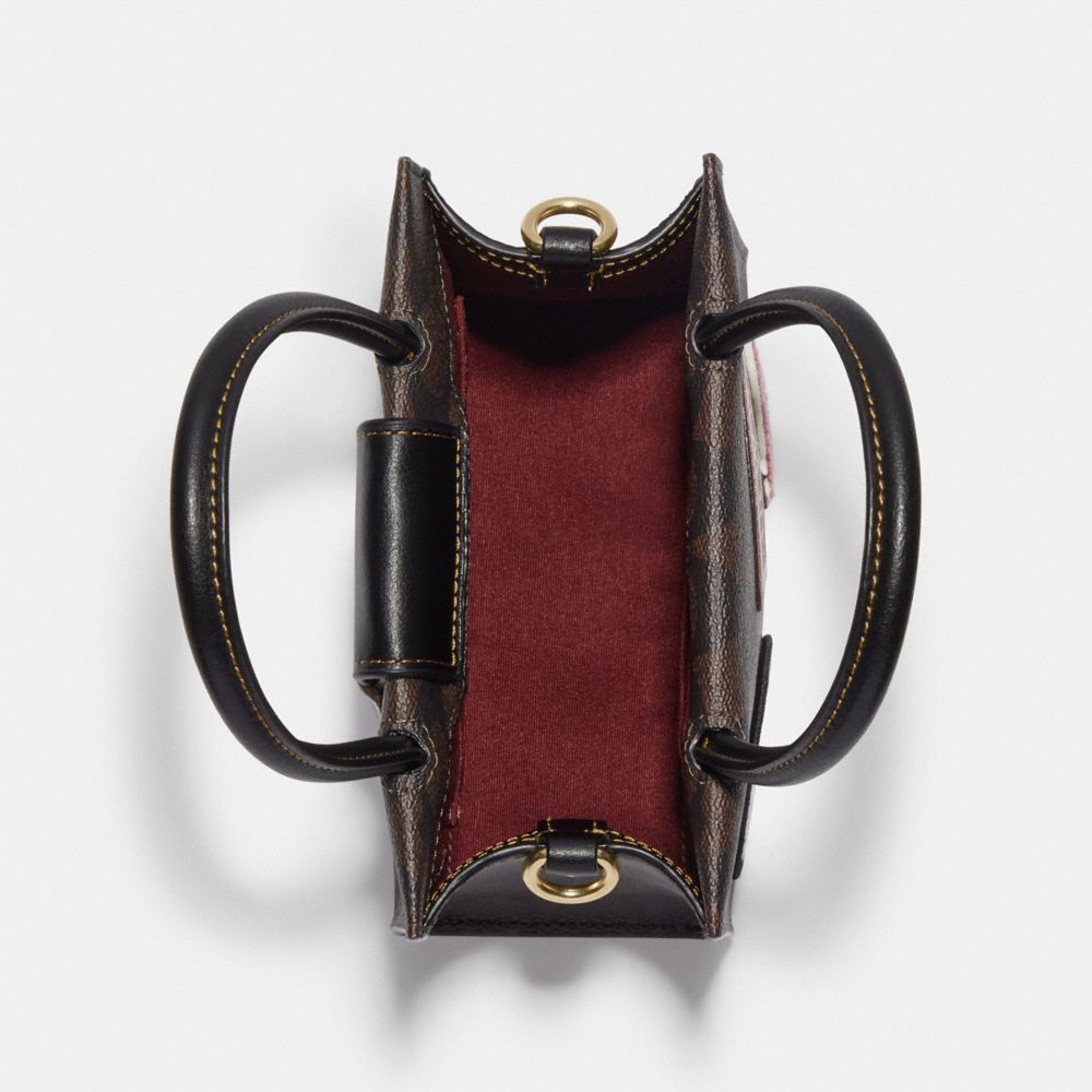 MINI CALLY CROSSBODY IN SIGNATURE CANVAS WITH SKI PATCHES