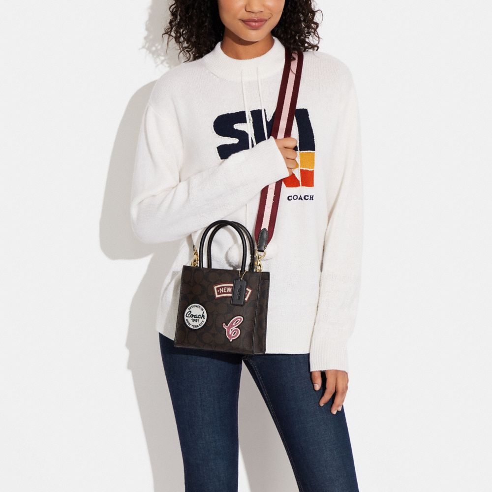 MINI CALLY CROSSBODY IN SIGNATURE CANVAS WITH SKI PATCHES