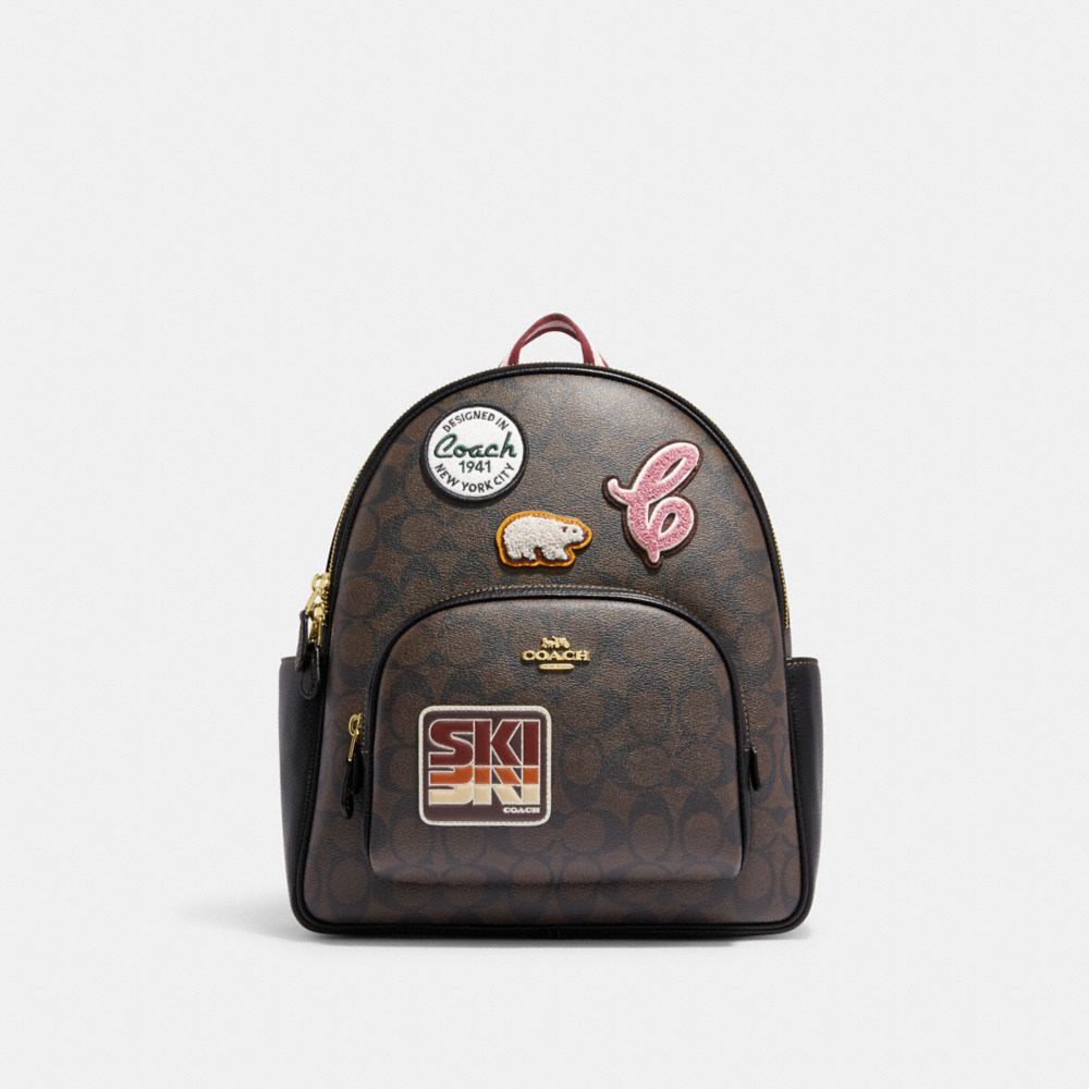 COACH CE595 Court Backpack In Signature Canvas With Ski Patches Gold/Brown Black Multi