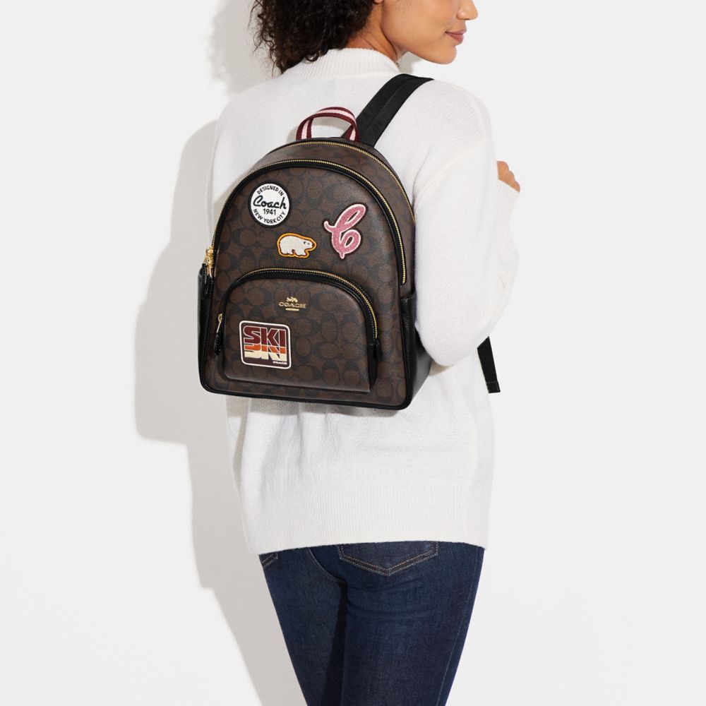 COURT BACKPACK IN SIGNATURE CANVAS WITH SKI PATCHES