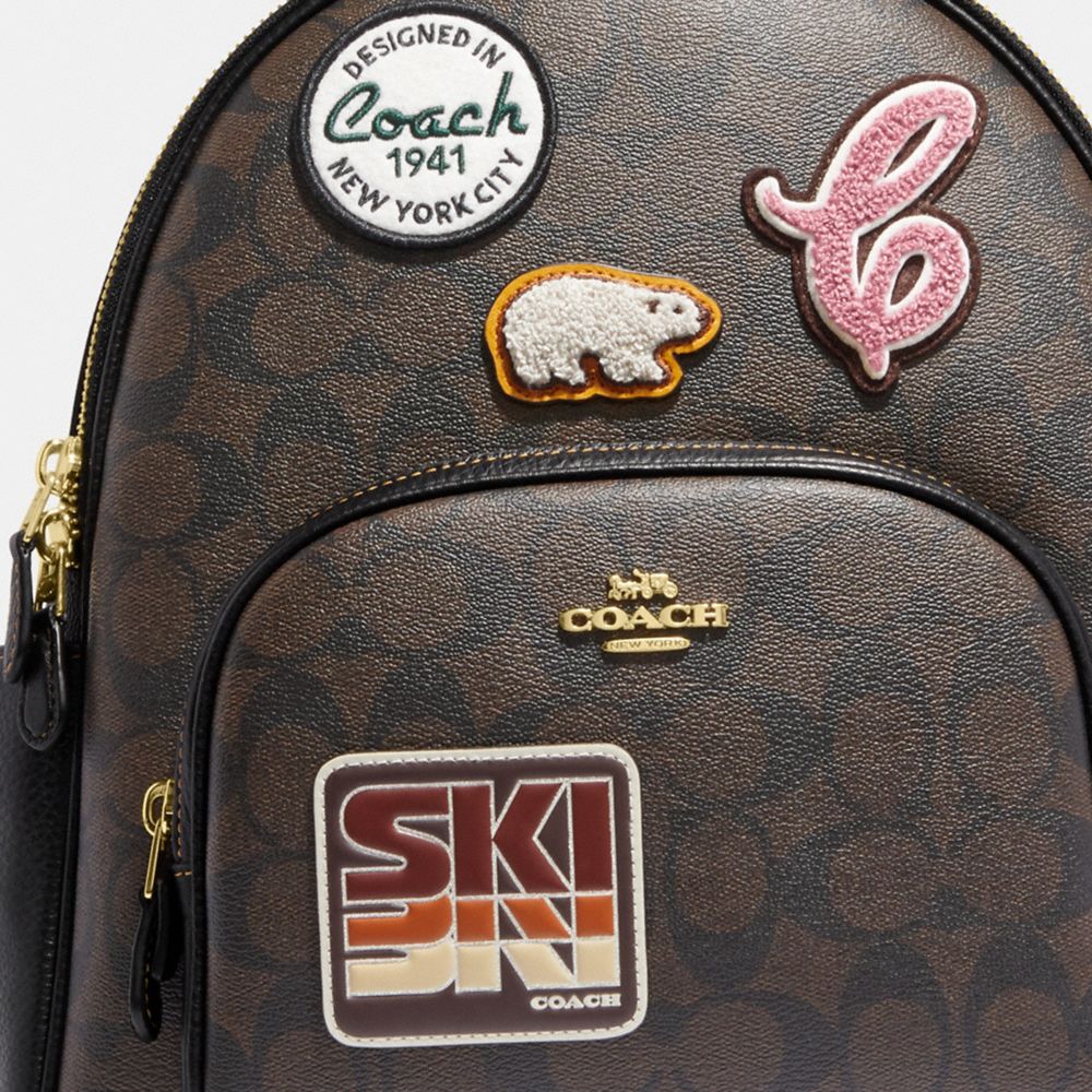 COURT BACKPACK IN SIGNATURE CANVAS WITH SKI PATCHES