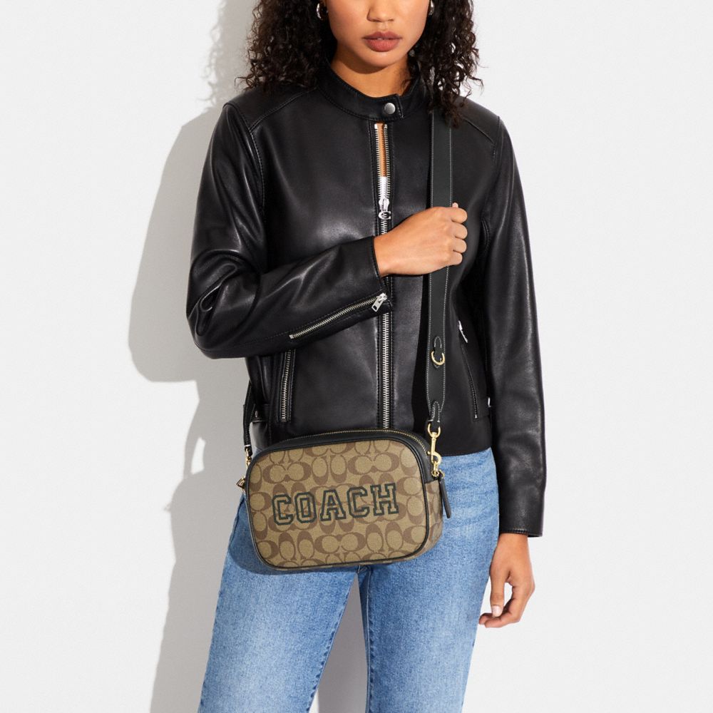 JAMIE CAMERA BAG IN SIGNATURE CANVAS WITH VARSITY MOTIF