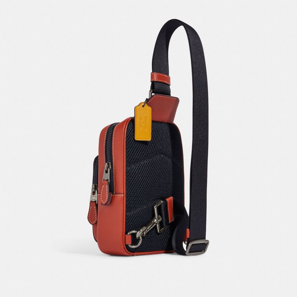 COACH X PEANUTS TRACK PACK 14 IN SIGNATURE CANVAS WITH SNOOPY WOODSTOCK PRINT