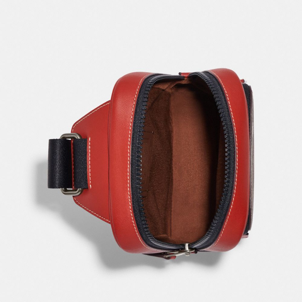 COACH X PEANUTS TRACK PACK 14 IN SIGNATURE CANVAS WITH SNOOPY WOODSTOCK PRINT