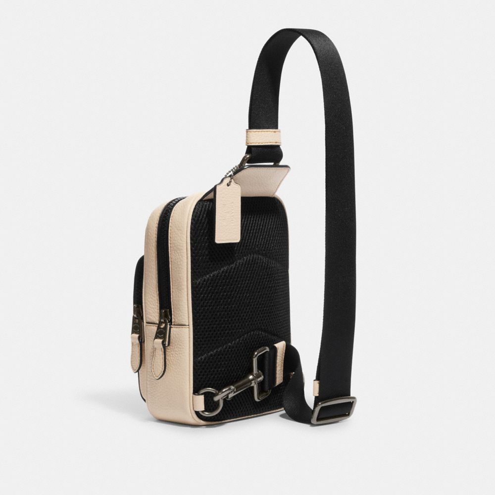 COACH X PEANUTS TRACK PACK 14 WITH SNOOPY MOTIF