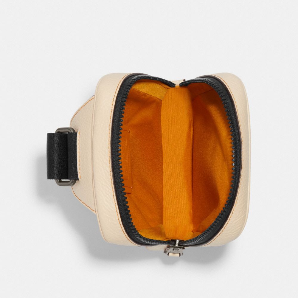 COACH X PEANUTS TRACK PACK 14 WITH SNOOPY MOTIF