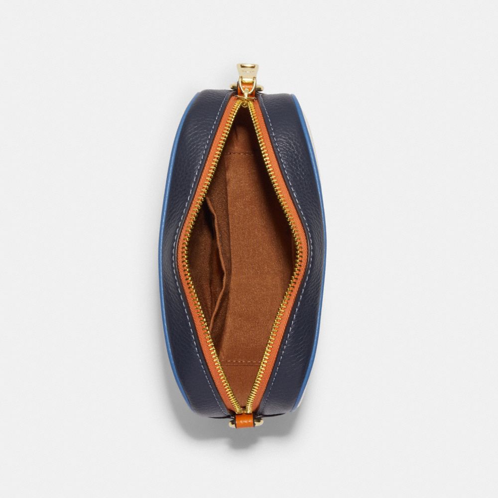 MINI JAMIE CAMERA BAG IN COLORBLOCK SIGNATURE CANVAS WITH COACH STAMP