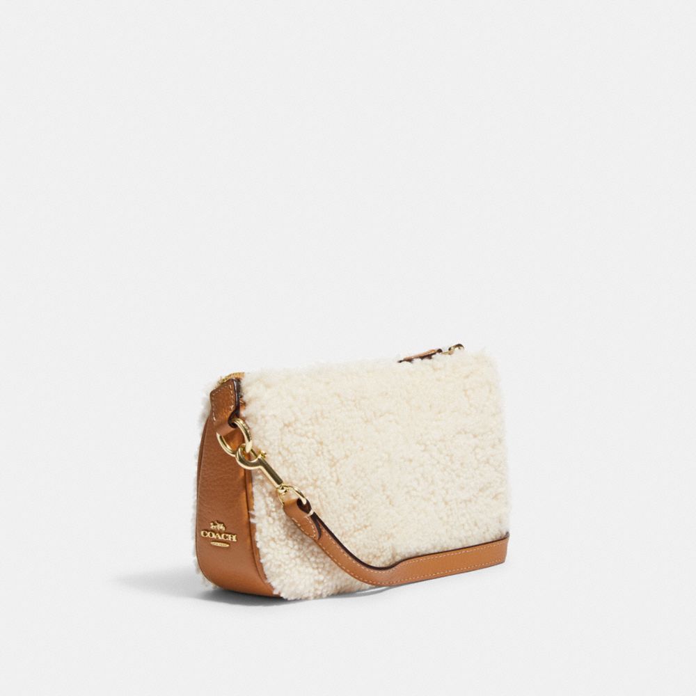 NOLITA 19 IN SHEARLING WITH COACH MOTIF
