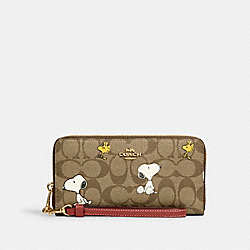 COACH CE705 Coach X Peanuts Long Zip Around Wallet In Signature Canvas With Snoopy Woodstock Print GOLD/KHAKI/REDWOOD MULTI