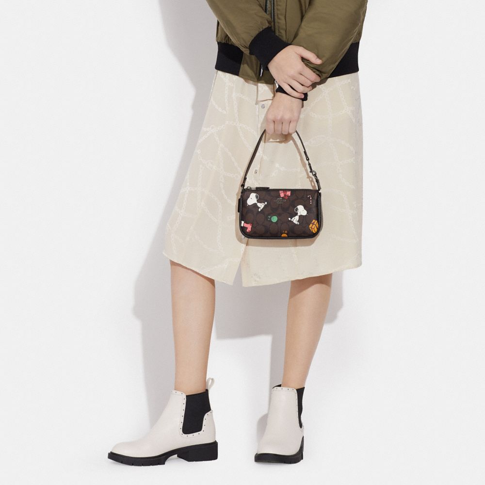 COACH X PEANUTS NOLITA 19 IN SIGNATURE CANVAS WITH SNOOPY PRESENTS PRINT