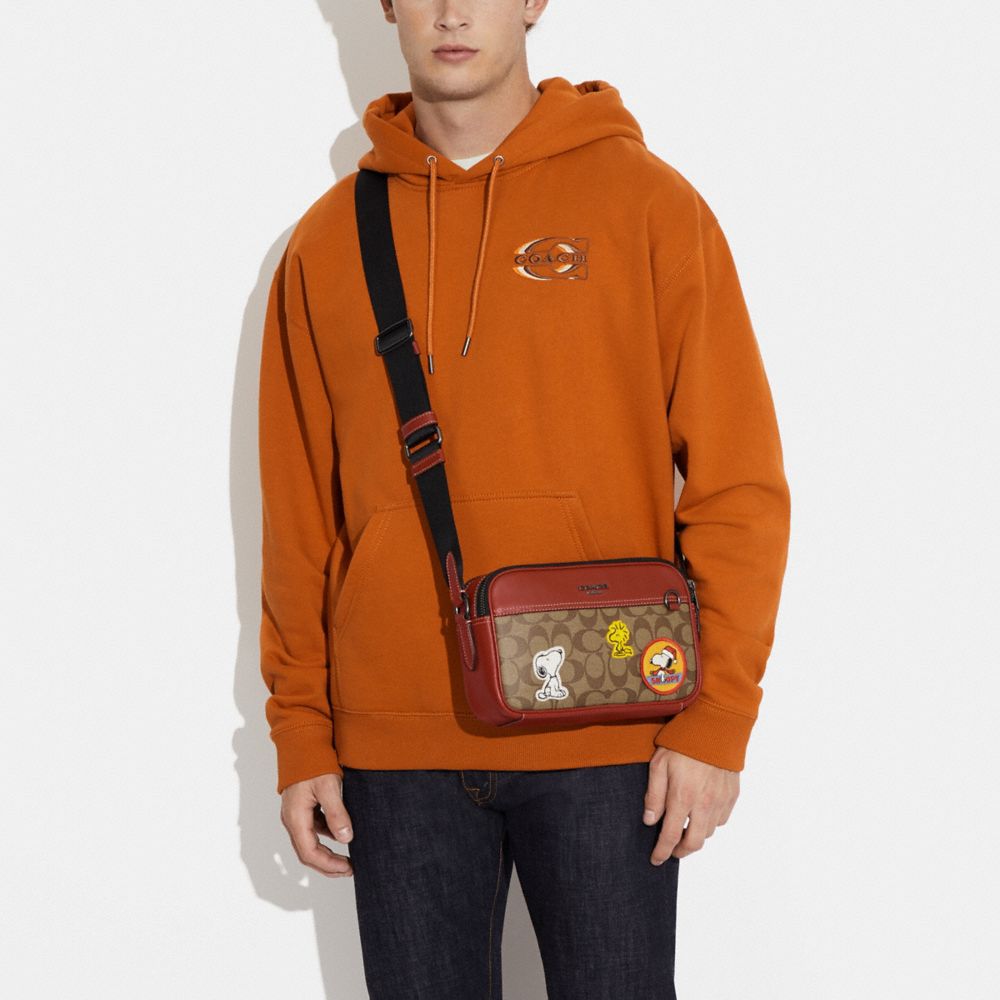 COACH X PEANUTS GRAHAM CROSSBODY IN SIGNATURE CANVAS WITH PATCHES