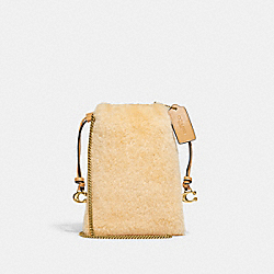 COACH CE759 Drawstring Pouch In Shearling BRASS/NATURAL