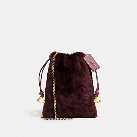 COACH CE759 Drawstring Pouch In Shearling Brass/Sangria