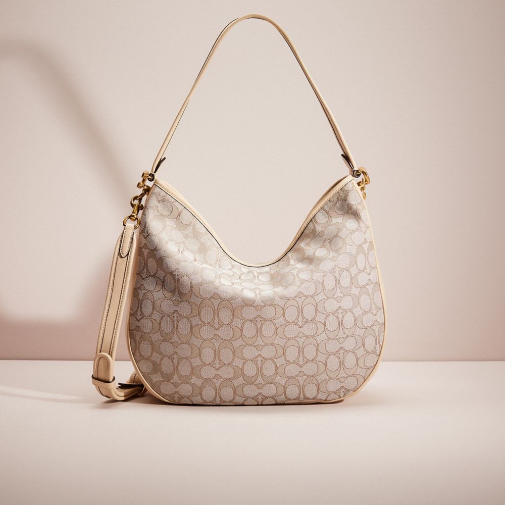 CE803 - Restored Soft Tabby Hobo In Signature Jacquard Brass/Stone Ivory