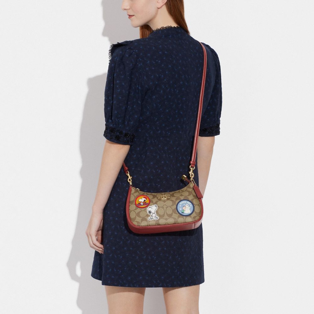 COACH X PEANUTS TERI SHOULDER BAG IN SIGNATURE CANVAS WITH PATCHES