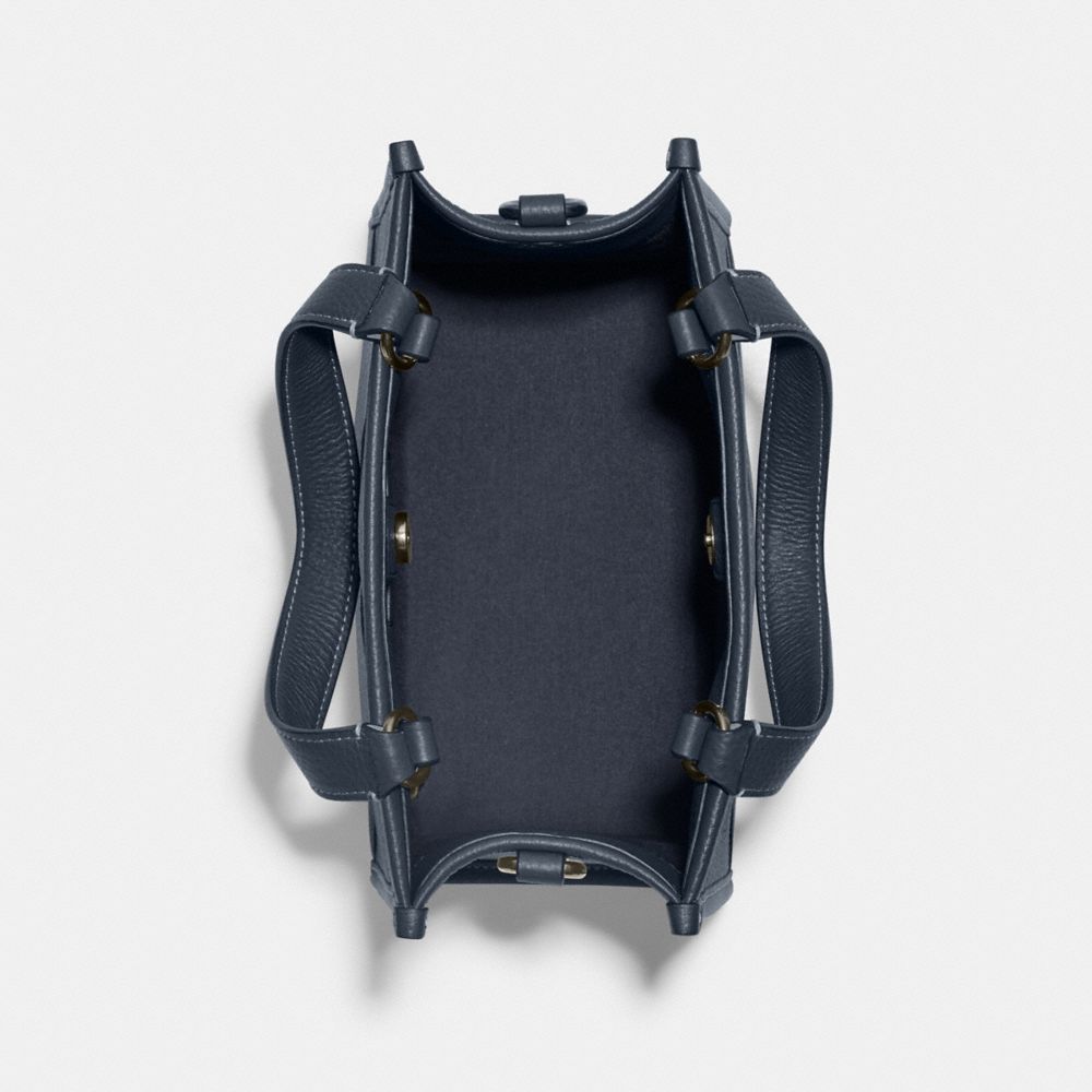 COACH X PEANUTS DEMPSEY TOTE 22 WITH SNOOPY SKI MOTIF