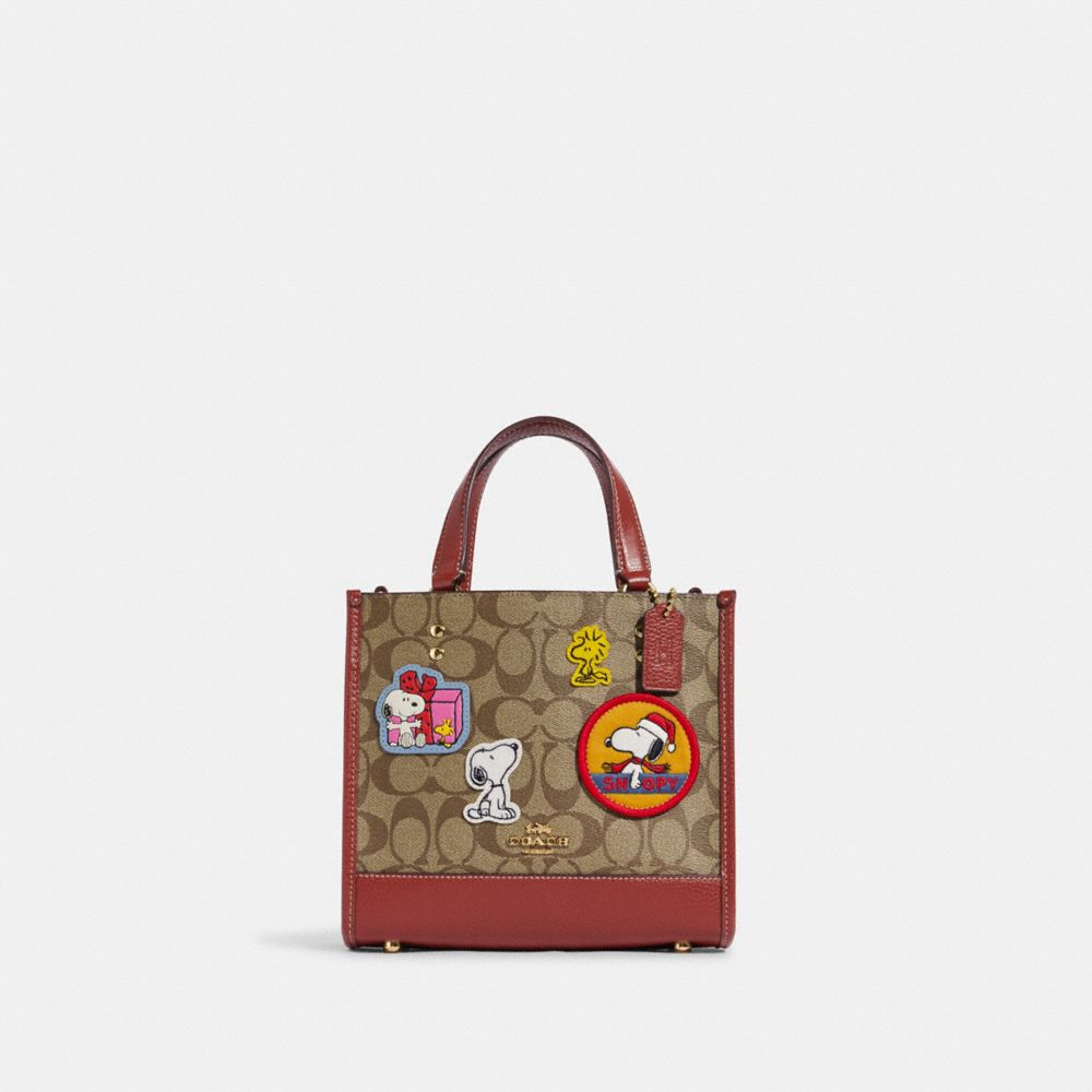 COACH CE851 Coach X Peanuts Dempsey Tote 22 In Signature Canvas With Patches GOLD/KHAKI/REDWOOD MULTI