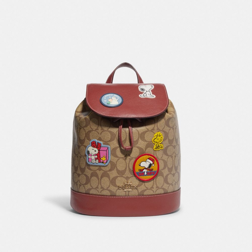 COACH CE853 Coach X Peanuts Dempsey Drawstring Backpack In Signature Canvas With Patches Gold/Khaki/Redwood Multi