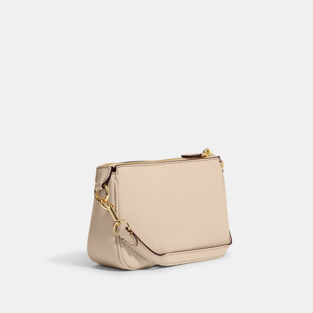 COACH X PEANUTS NOLITA 19 WITH SNOOPY AND FRIENDS MOTIF