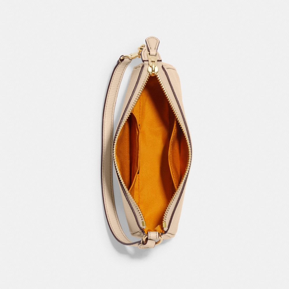 COACH X PEANUTS NOLITA 19 WITH SNOOPY AND FRIENDS MOTIF