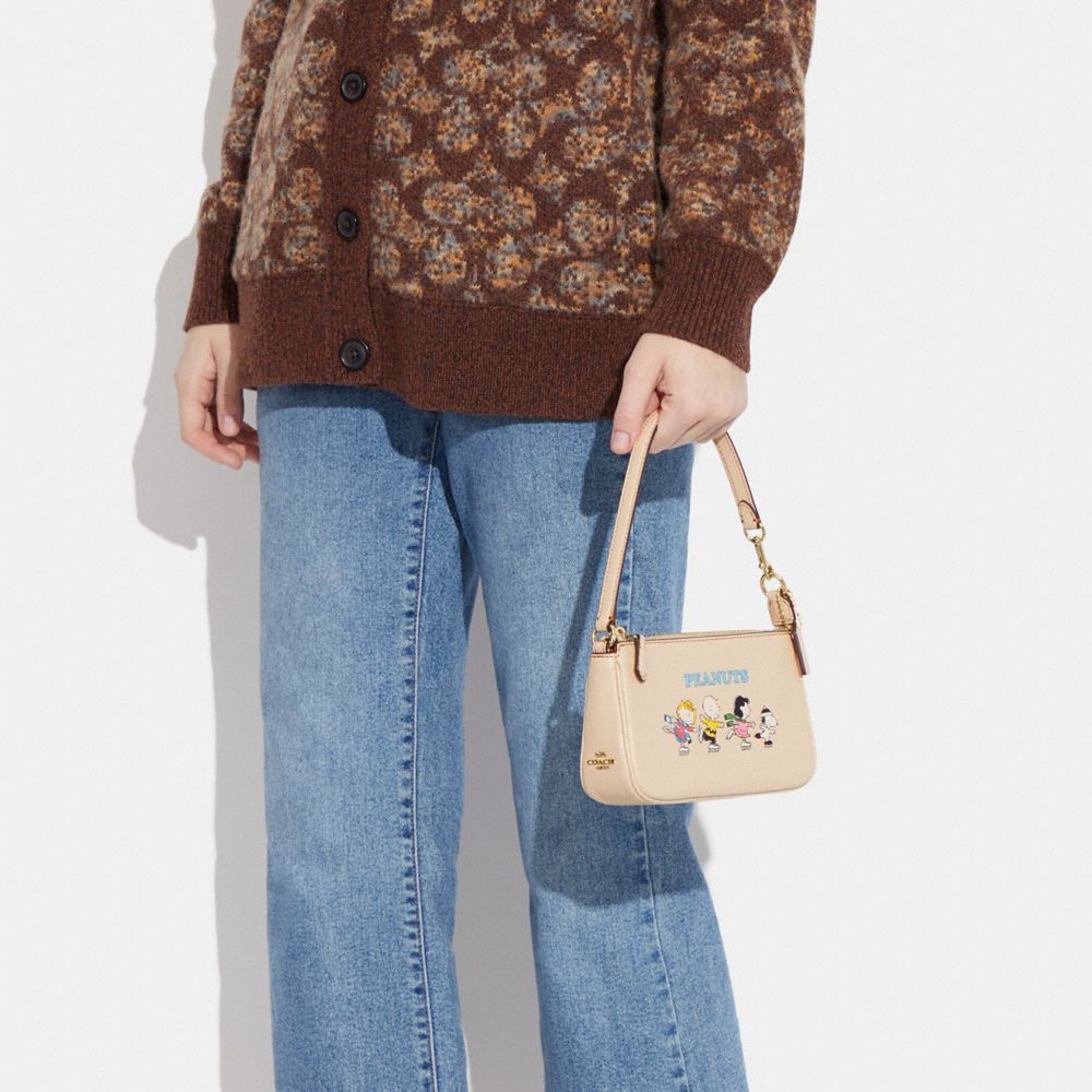 COACH X PEANUTS NOLITA 19 WITH SNOOPY AND FRIENDS MOTIF