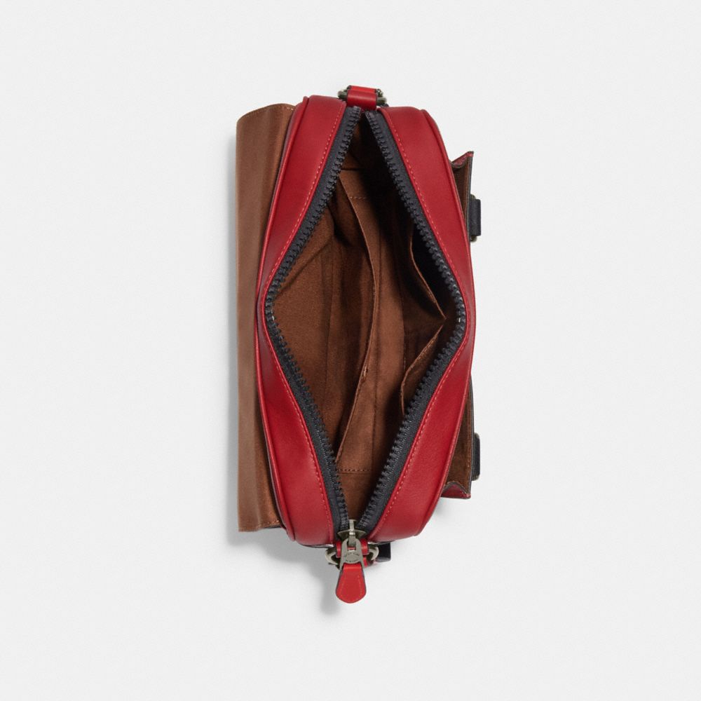 TRACK CROSSBODY IN COLORBLOCK SIGNATURE CANVAS WITH COACH STAMP