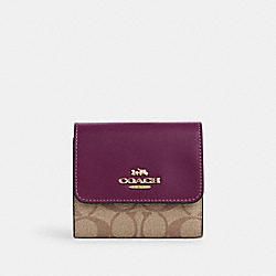Small Trifold Wallet In Blocked Signature Canvas - CE930 - Gold/Khaki/Deep Berry