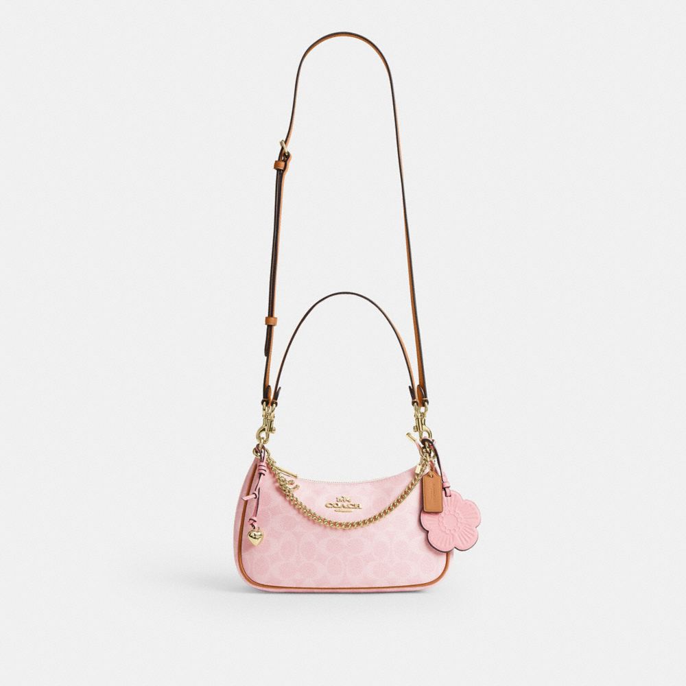 TERI SHOULDER BAG IN SIGNATURE CANVAS WITH CHARMS