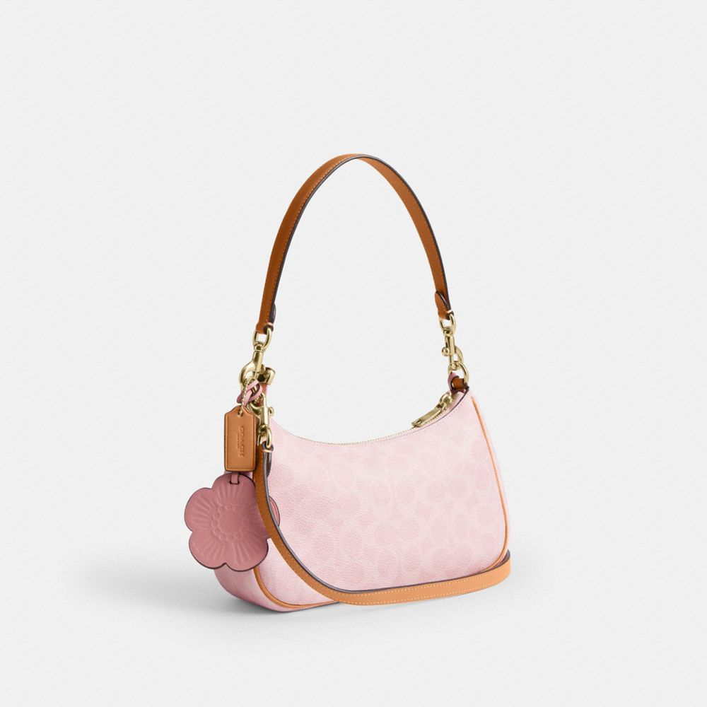 TERI SHOULDER BAG IN SIGNATURE CANVAS WITH CHARMS