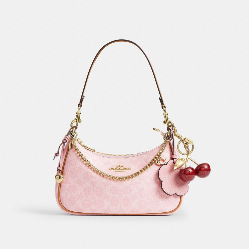 TERI SHOULDER BAG IN SIGNATURE CANVAS WITH CHARMS