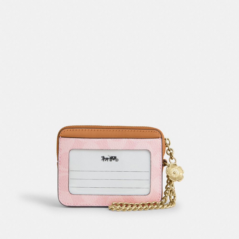ZIP CARD CASE IN SIGNATURE CANVAS WITH CHARM