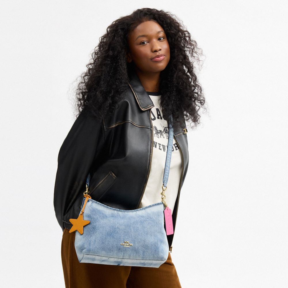 LAUREL SHOULDER BAG IN LOVED DENIM WITH CHARMS