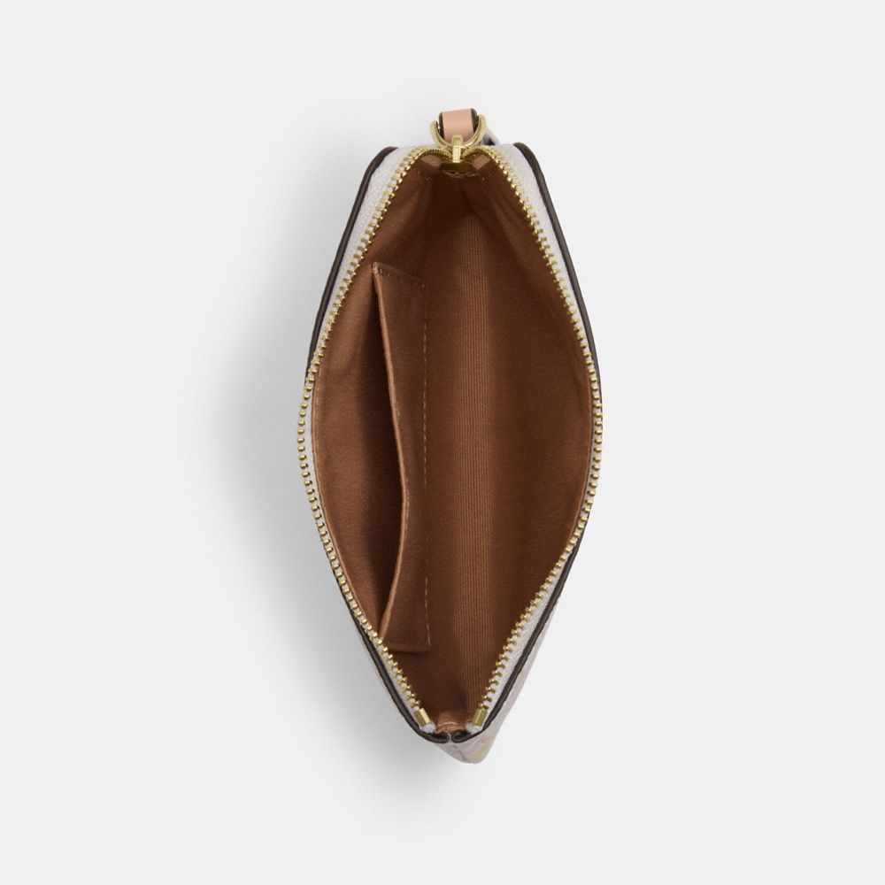CORNER ZIP WRISTLET IN PRETTY SIGNATURE CANVAS