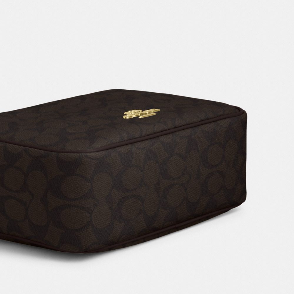 CAREY CROSSBODY BAG IN SIGNATURE CANVAS