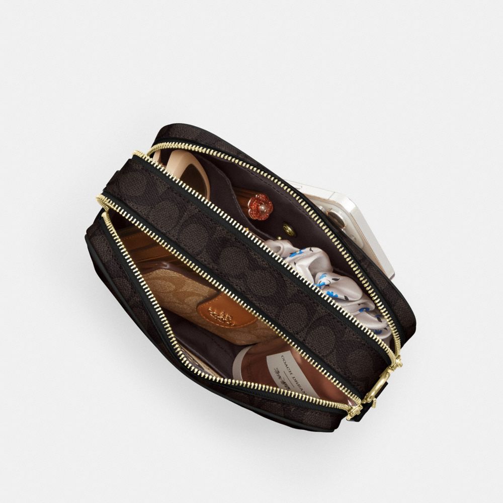 CAREY CROSSBODY BAG IN SIGNATURE CANVAS