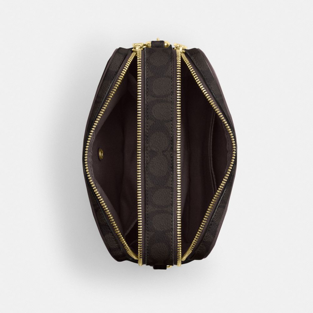 CAREY CROSSBODY BAG IN SIGNATURE CANVAS