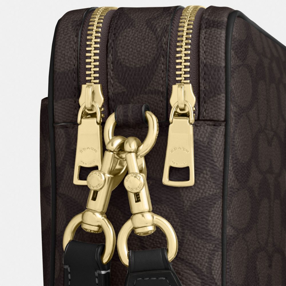 CAREY CROSSBODY BAG IN SIGNATURE CANVAS