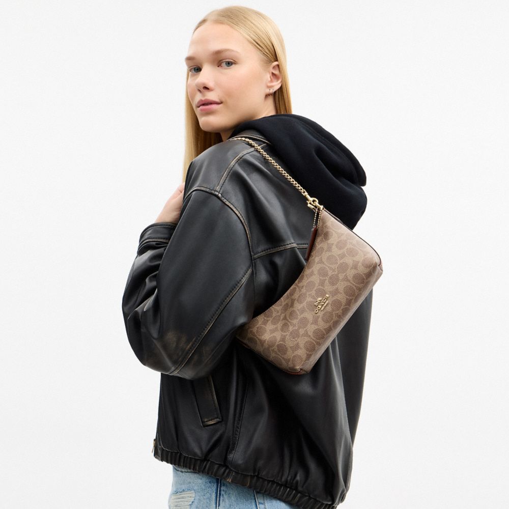CAITLIN SHOULDER BAG IN SIGNATURE CANVAS