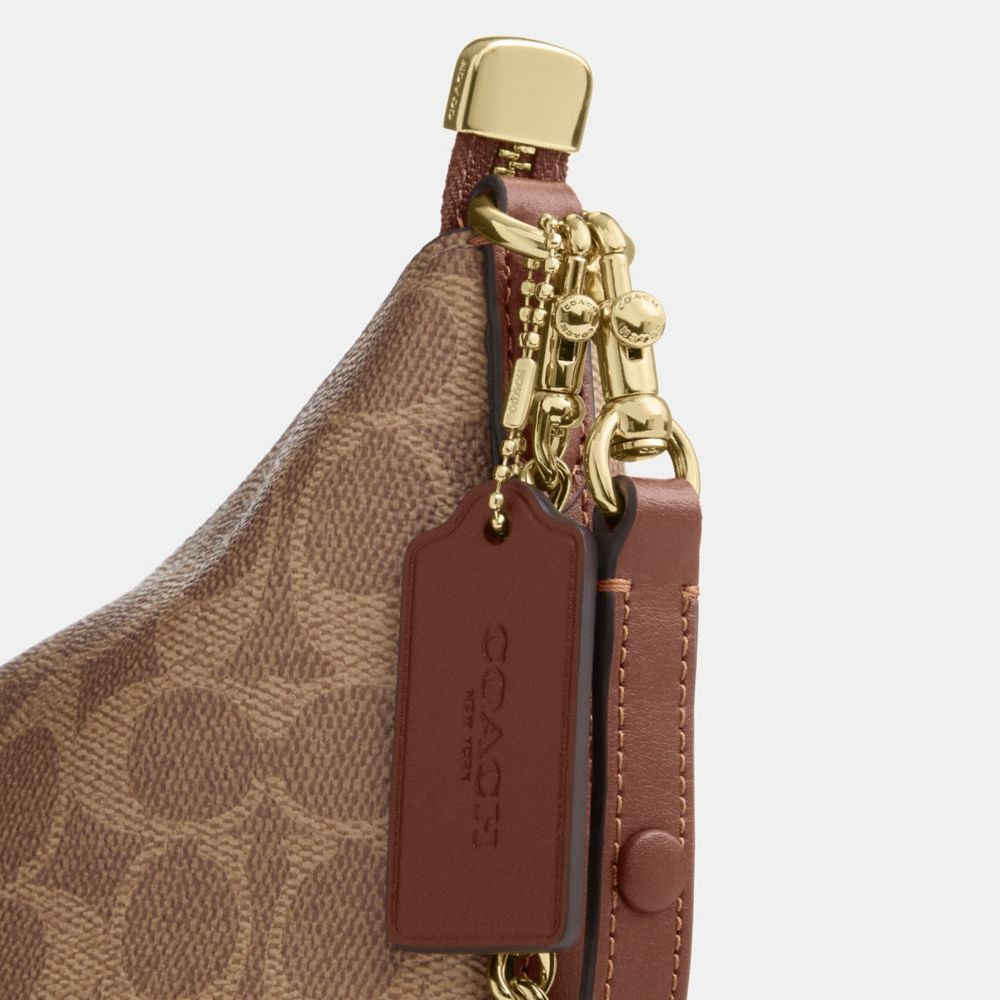 CAITLIN SHOULDER BAG IN SIGNATURE CANVAS