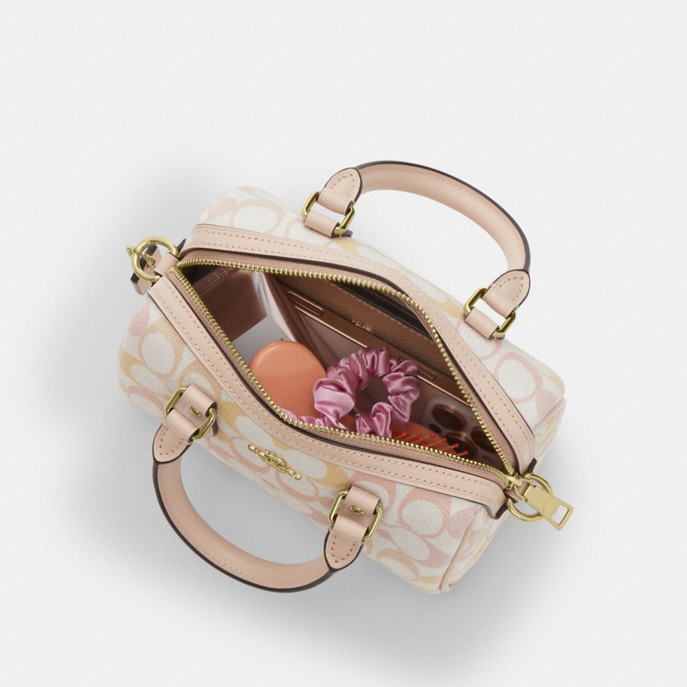 MINI ROWAN CROSSBODY BAG IN PRETTY SIGNATURE CANVAS
