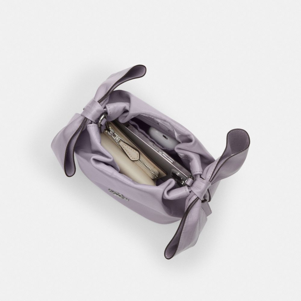 FAYE MINI DRAWSTRING BAG WITH BOWS