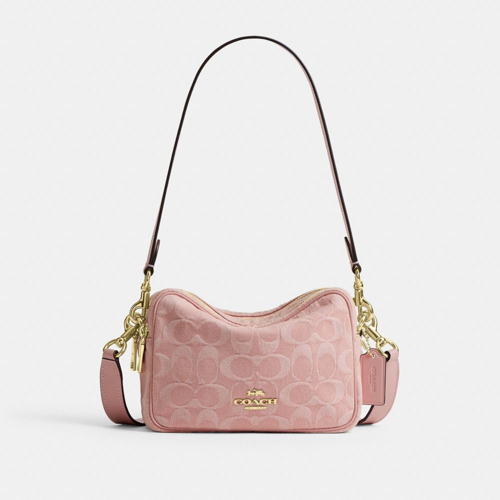 MINI CAREY CROSSBODY BAG IN SIGNATURE DENIM