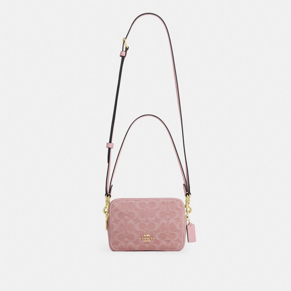 MINI CAREY CROSSBODY BAG IN SIGNATURE DENIM
