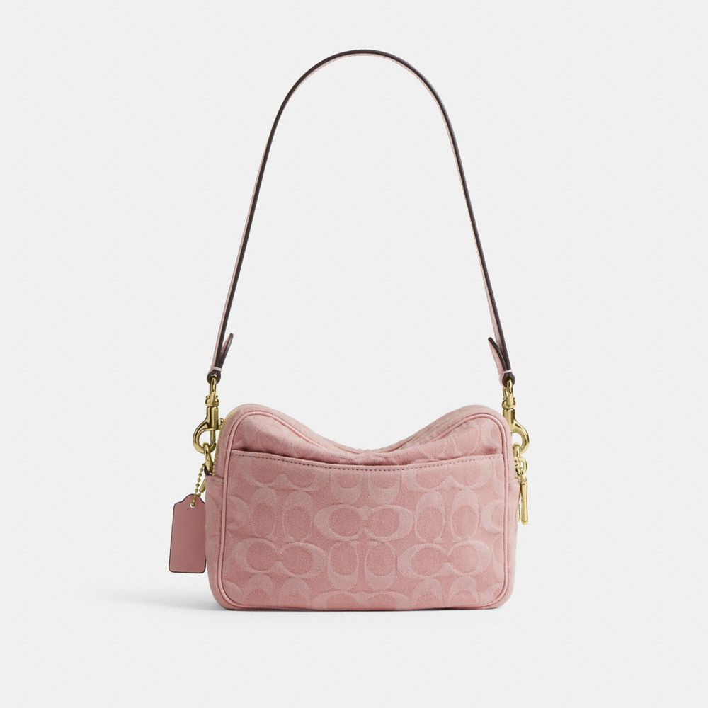 MINI CAREY CROSSBODY BAG IN SIGNATURE DENIM