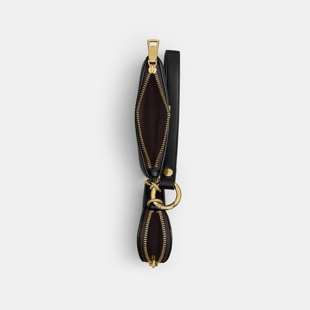 WRISTLET AND HEART POUCH IN SIGNATURE CANVAS WITH CHARM