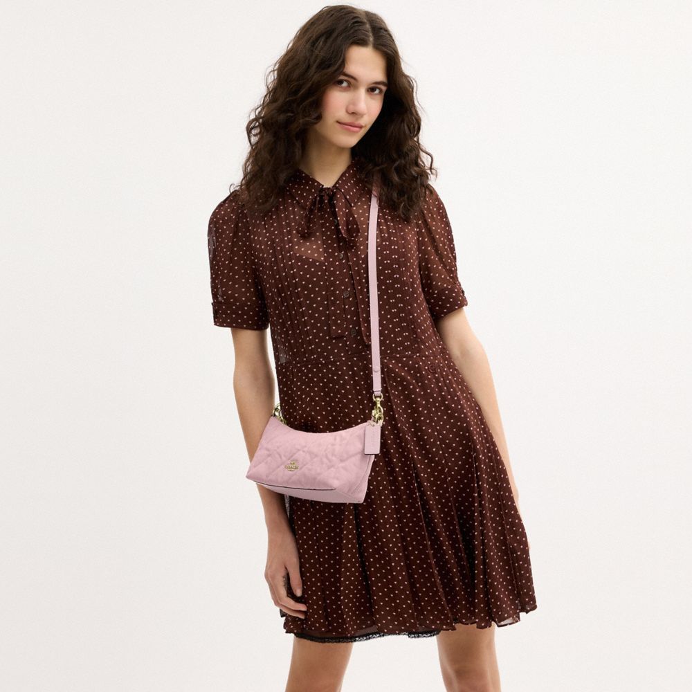 CAITLIN SHOULDER BAG IN REGENERATIVE COTTON WITH QUILTING AND CHARM